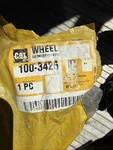 New Genuine Caterpillar Wheel Part # 100-3426. Fixed Price $30.00.